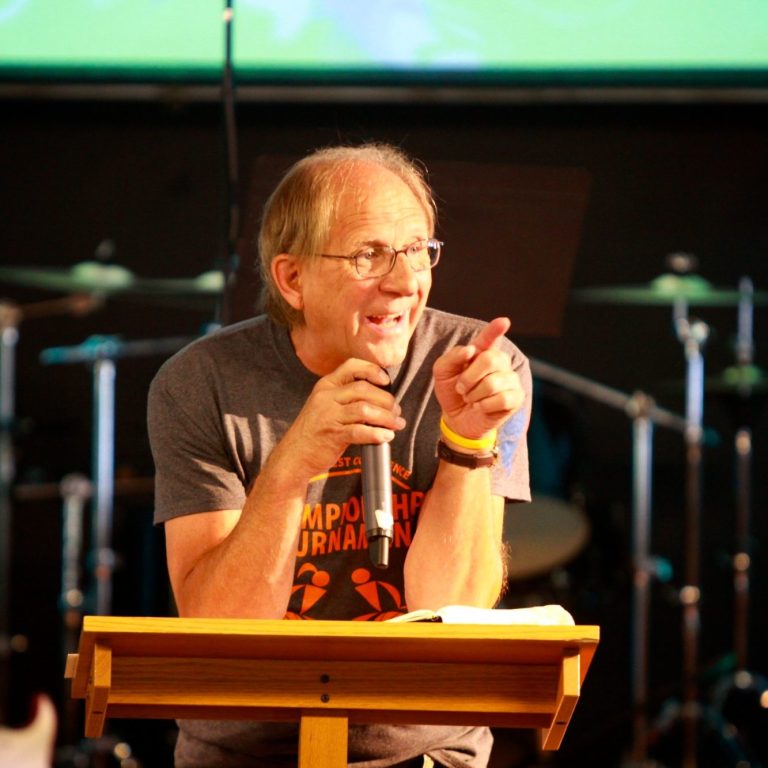 Chuck speaks at a youth gathering